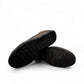 Atropat Abyaneh black leather slip-on shoes with handmade stitching and durable rubber outsole. Photo of bottom view.