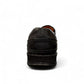Atropat Abyaneh black leather slip-on shoes with handmade stitching and durable rubber outsole. Photo of back view.