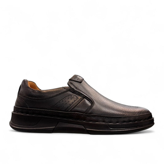 Atropat Abyaneh black leather slip-on shoes with handmade stitching and durable rubber outsole. Photo of outside side view.