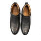 Atropat Amin black leather boots with textured upper, rubber outsole, and subtle handmade stitching. Photo of upper view.