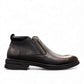Atropat Amin black leather boots with textured upper, rubber outsole, and subtle handmade stitching. Photo of outside side view.