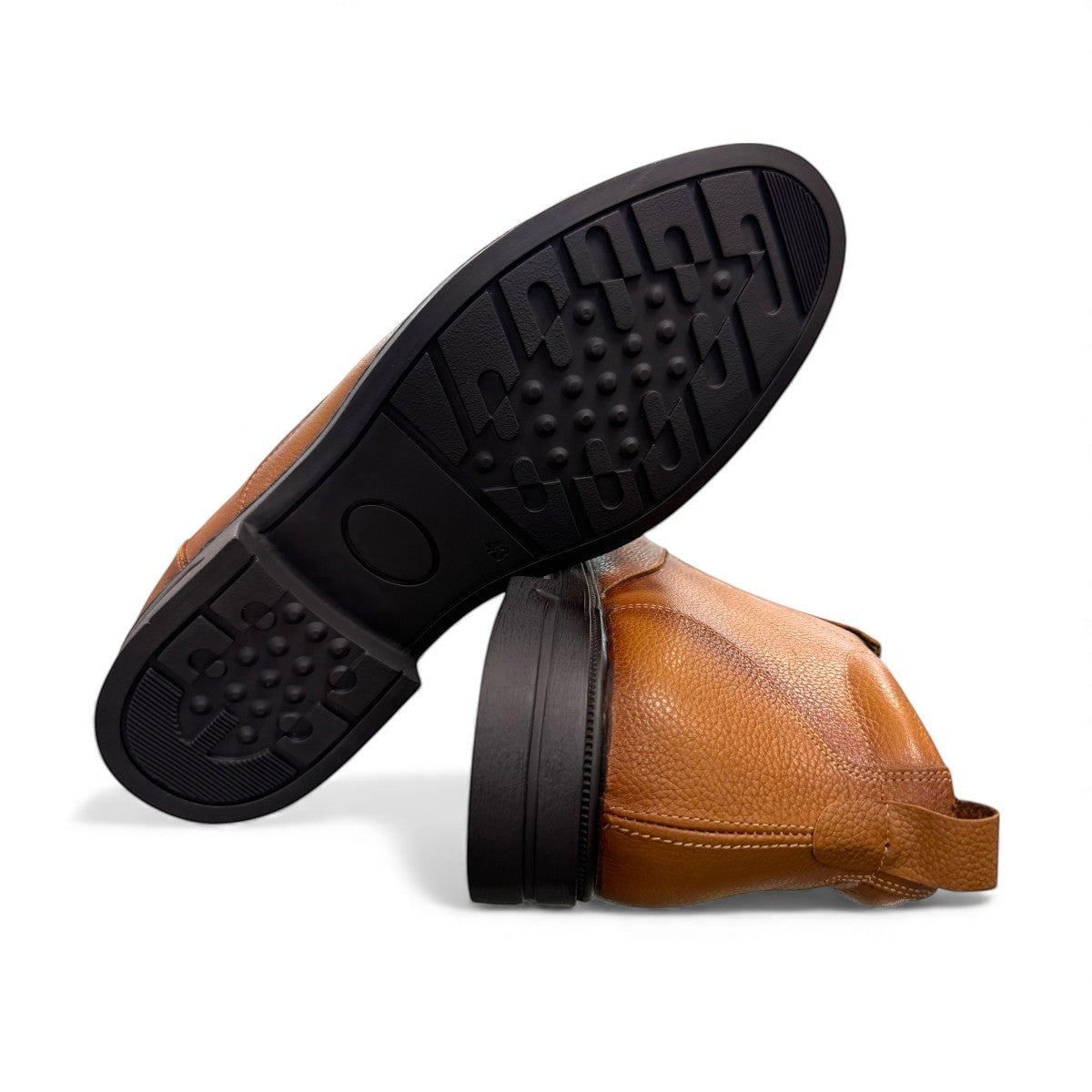 Atropat Amin brown genuine leather slip-on boots with handmade stitching and durable rubber outsole. Photo of bottom view.