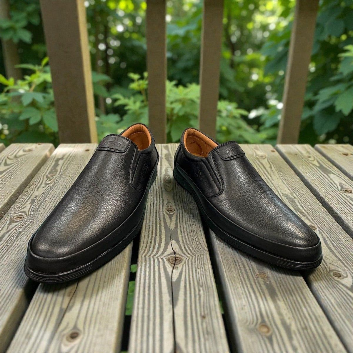 Atropat Bahar black leather slip-on shoes with handmade stitching and durable rubber outsole. Photo of front view 2.