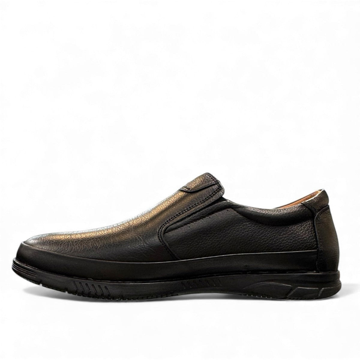 Atropat Bahar black leather slip-on shoes with handmade stitching and durable rubber outsole. Photo of inside side view.