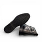 Atropat Bamdad black leather ankle boots with a side buckle strap and durable rubber outsole. Photo of bottom view.