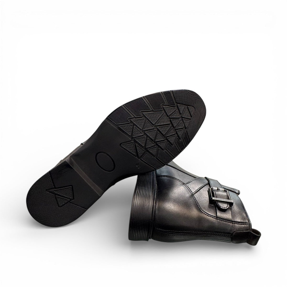 Atropat Bamdad black leather ankle boots with a side buckle strap and durable rubber outsole. Photo of bottom view.