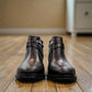 Atropat Bamdad black leather ankle boots with a side buckle strap and durable rubber outsole. Photo of front view.