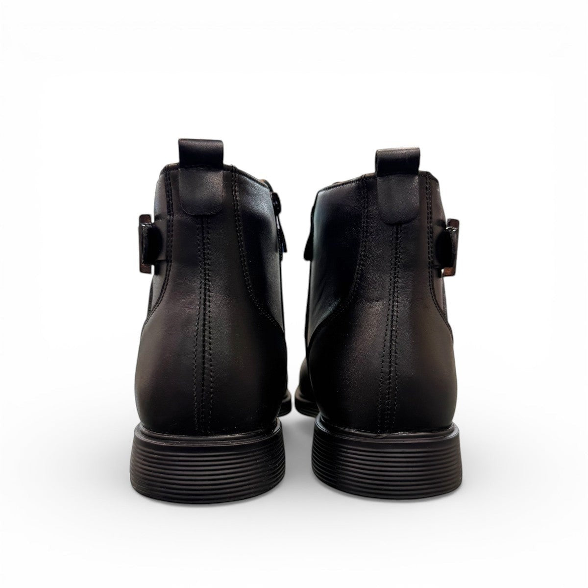 Atropat Bamdad black leather ankle boots with a side buckle strap and durable rubber outsole. Photo of back view.