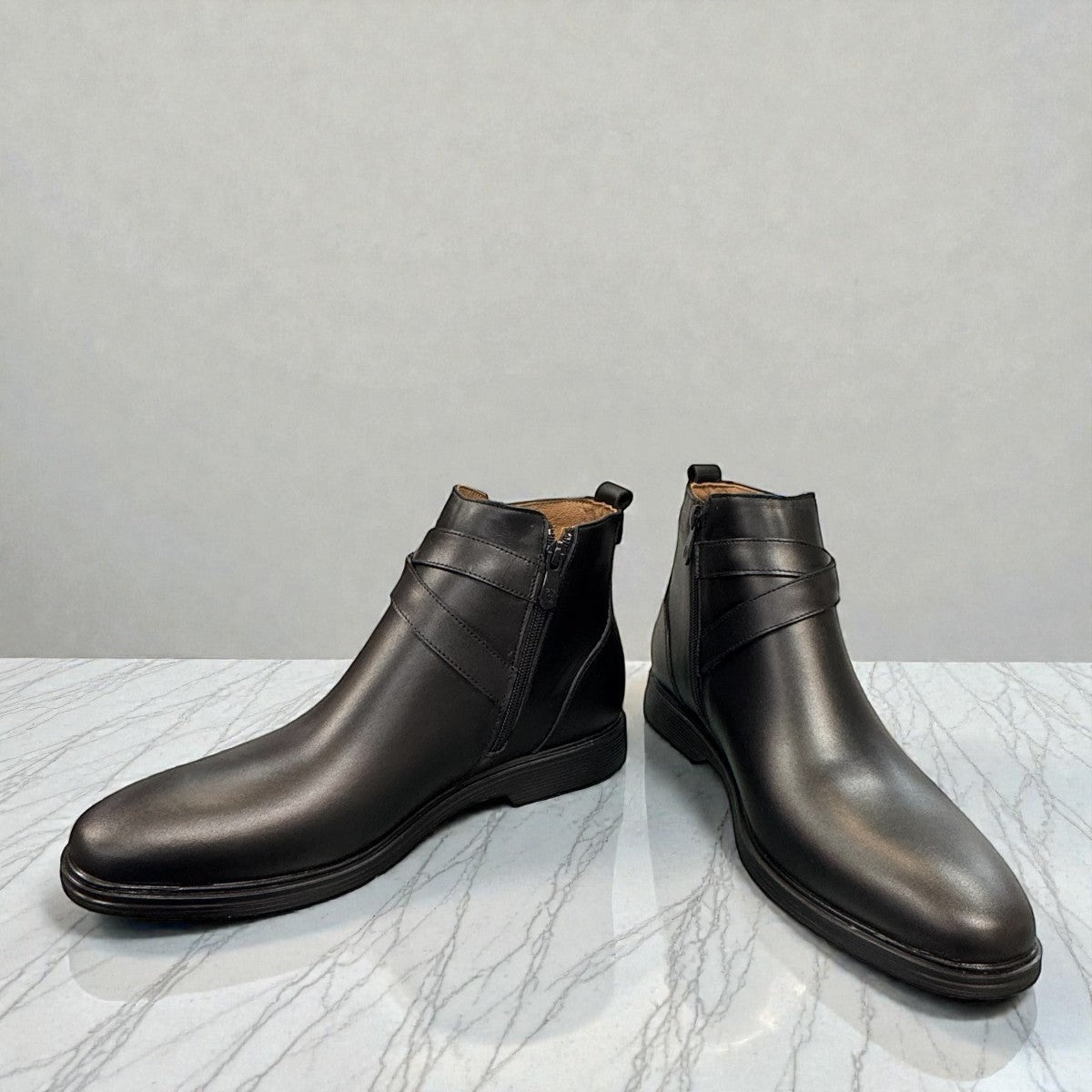 Atropat Bamdad black leather ankle boots with a side buckle strap and durable rubber outsole. Photo of upper view.
