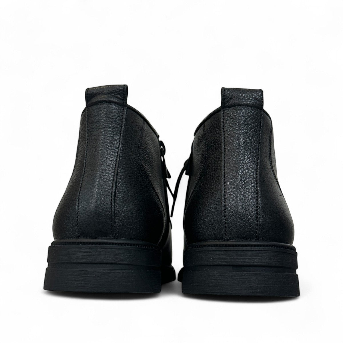 Atropat Ferdowsi black genuine leather chukka boots with handmade stitching and rubber outsole. Photo of back view 1.