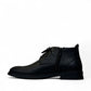 Atropat Ferdowsi black genuine leather chukka boots with handmade stitching and rubber outsole. Photo of inside side view.
