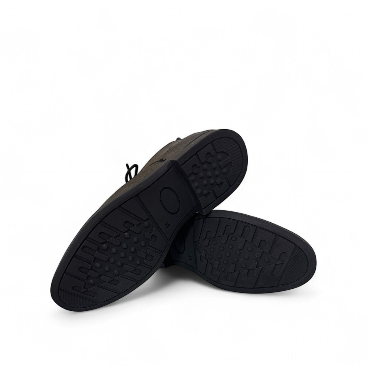 Atropat Ferdowsi black genuine leather chukka boots with handmade stitching and rubber outsole. Photo of bottom view.
