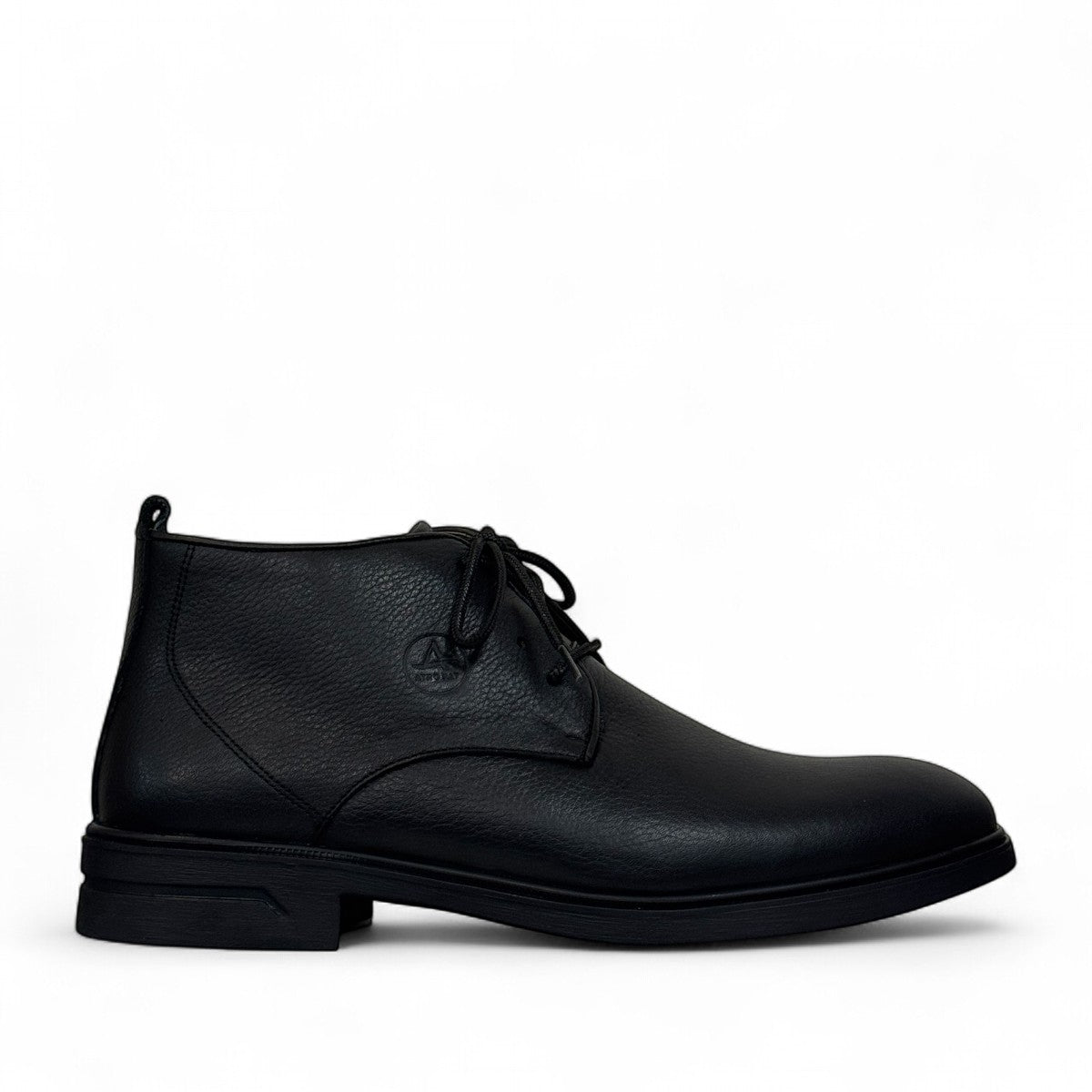 Atropat Ferdowsi black genuine leather chukka boots with handmade stitching and rubber outsole. Photo of outside side view.