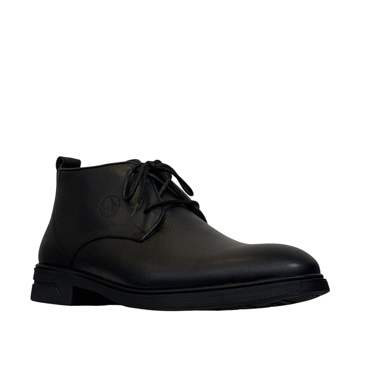 Atropat Ferdowsi black genuine leather chukka boots with handmade stitching and rubber outsole. Photo of front view at an angle.
