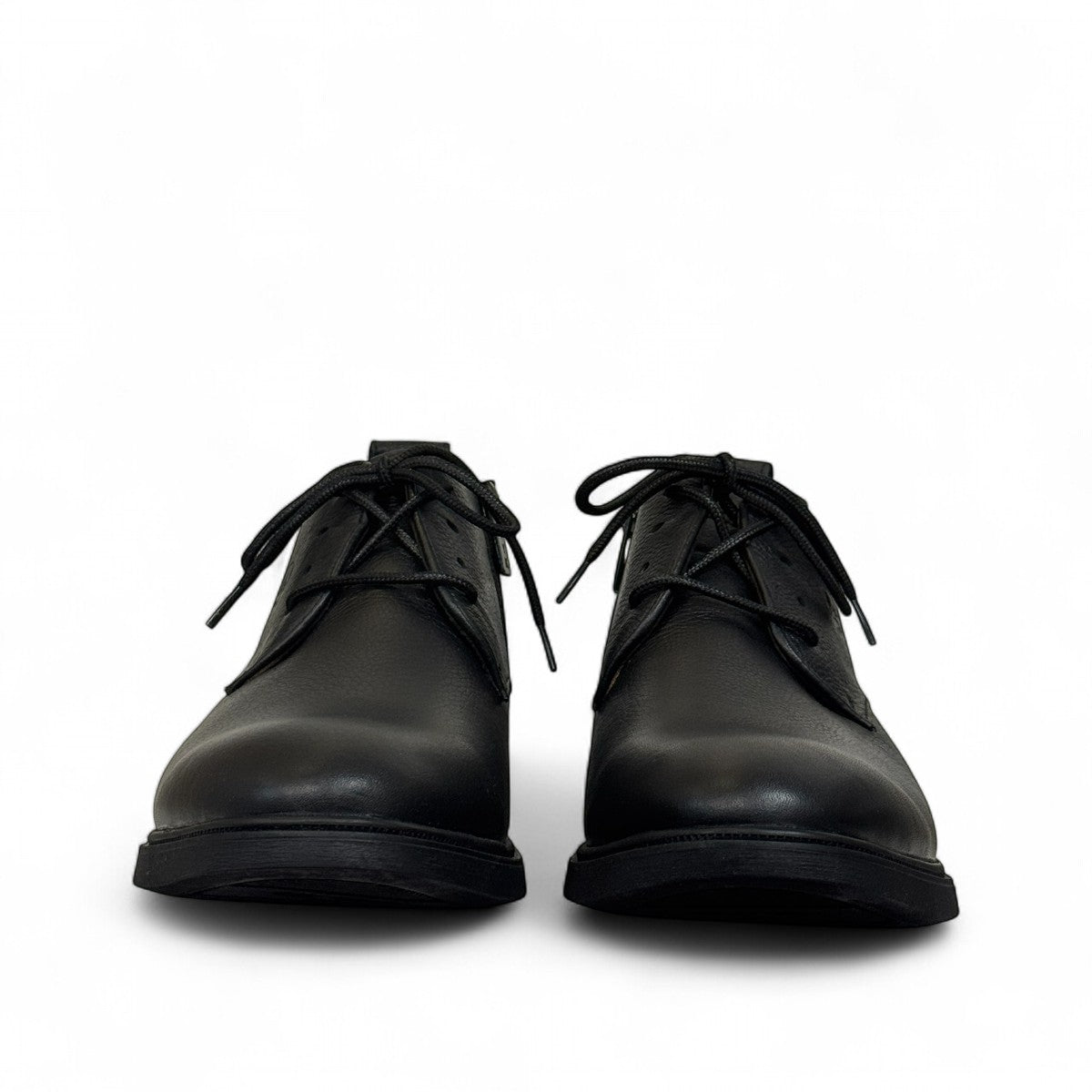 Atropat Ferdowsi black genuine leather chukka boots with handmade stitching and rubber outsole. Photo of front view.