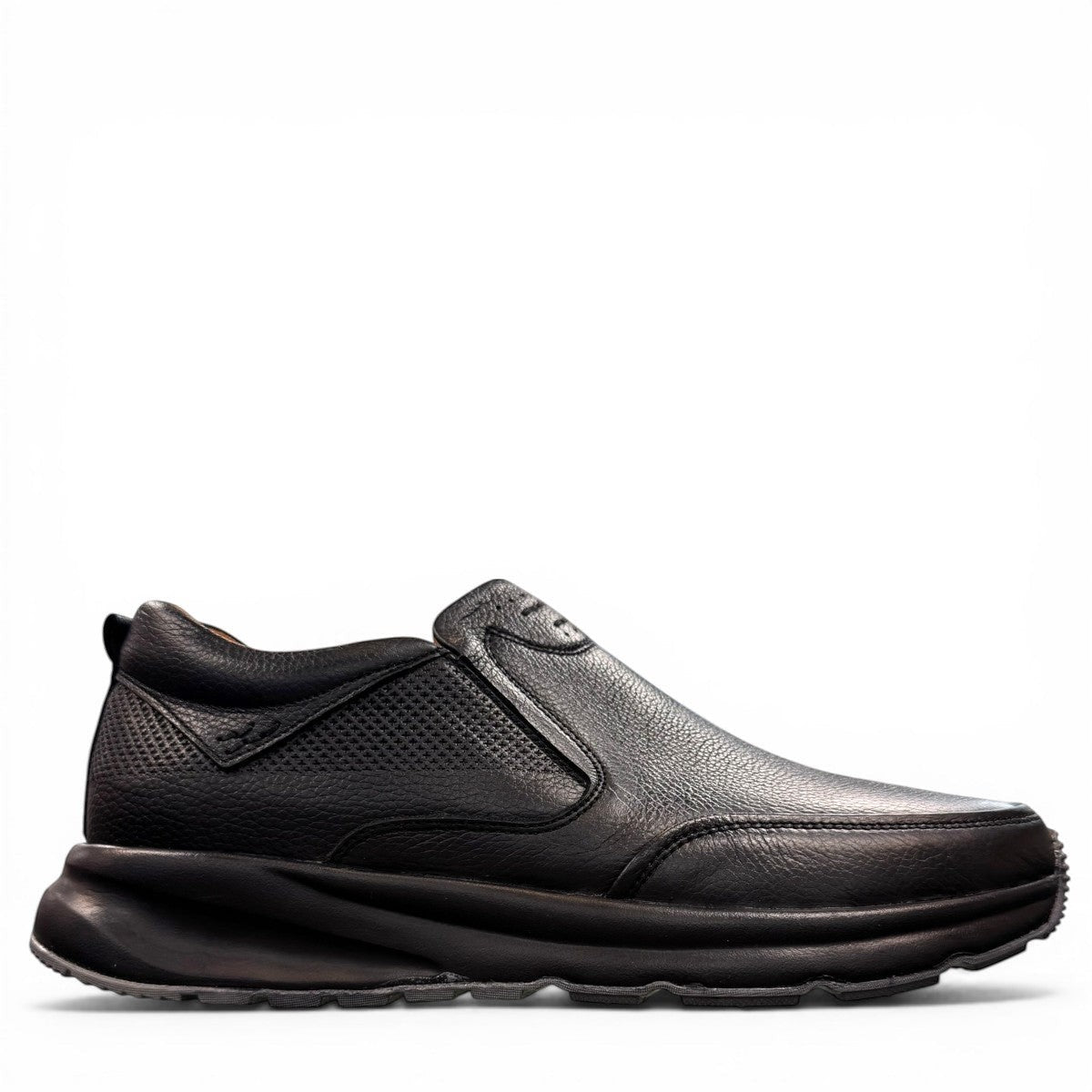 Atropat Kaya black leather slip-on shoes with textured upper and durable rubber sole. Photo of left side view.