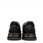 Atropat Kaya black leather slip-on shoes with textured upper and durable rubber sole. Photo of back view.