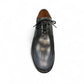 Atropat Kellyi black and navy leather oxford shoe with handmade stitching and rubber outsole. Photo of front view.