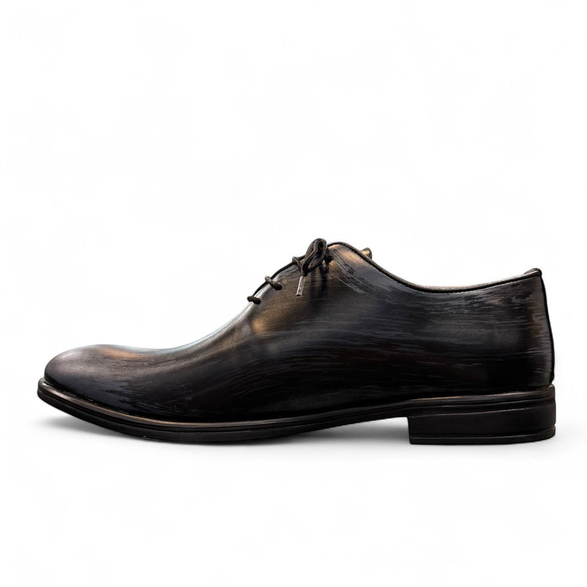 Atropat Kellyi black and navy leather oxford shoe with handmade stitching and rubber outsole. Photo of inside side view.