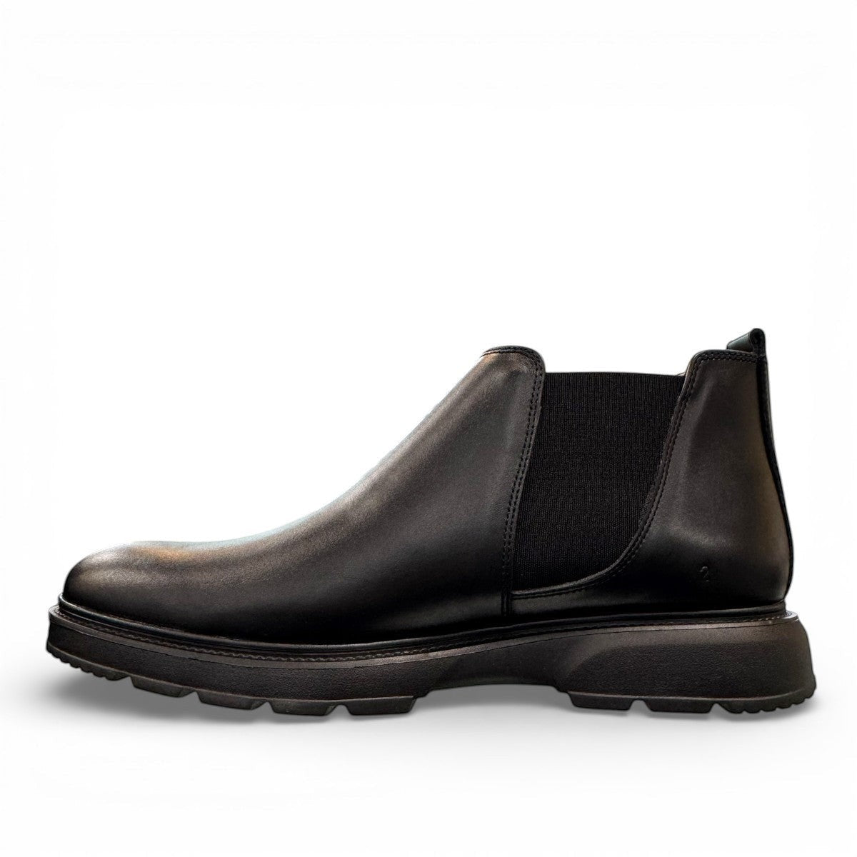 Atropat Mikhak black genuine leather Chelsea boots with rubber outsole and subtle handmade stitching. Photo of inside side view.