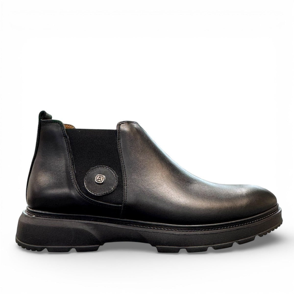 Atropat Mikhak black genuine leather Chelsea boots with rubber outsole and subtle handmade stitching. Photo of outside view.