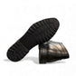 Atropat Nezami black genuine leather ankle boots with handmade stitching and durable rubber outsole. Photo of bottom view.