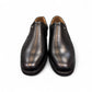 Atropat Parsa black leather slip-on shoe with handmade stitching and durable rubber outsole. Photo of front view.