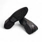 Atropat Parsa black leather slip-on shoe with handmade stitching and durable rubber outsole. Photo of bottom view.