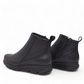 BAERCHI black leather casual ankle boots with a comfortable rubber sole. Photo of back view.