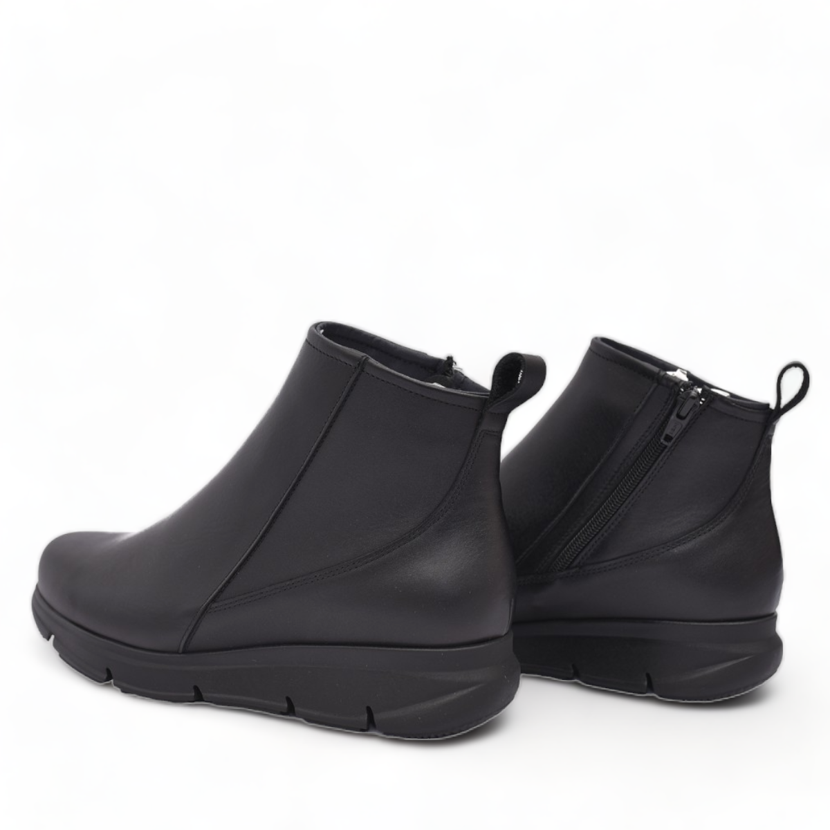 BAERCHI black leather casual ankle boots with a comfortable rubber sole. Photo of back view.
