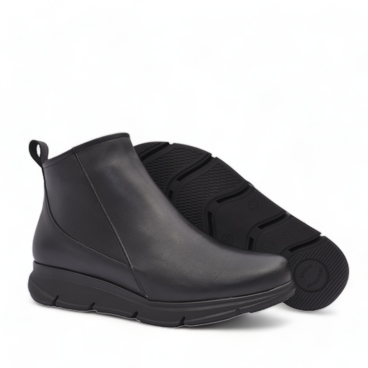 BAERCHI black leather casual ankle boots with a comfortable rubber sole. Photo of bottom view.