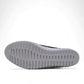 Bernie Mev Tina black slip-on loafers with perforated fabric upper and white rubber platform sole