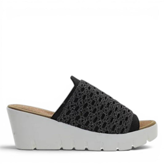 Bernie Mev Venti wedge sandal in black crochet with a white platform sole and open toe design.