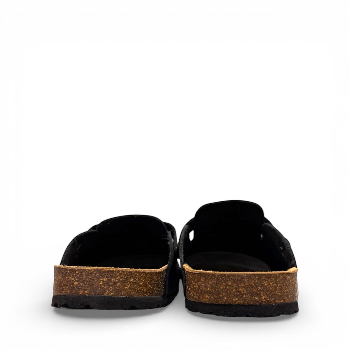 Biotime Burly black leather clogs showing the textured EVA outsole and cork footbed from below.