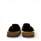 Biotime Burly dark brown oiled leather clogs showing the patterned EVA outsole and cork footbed.