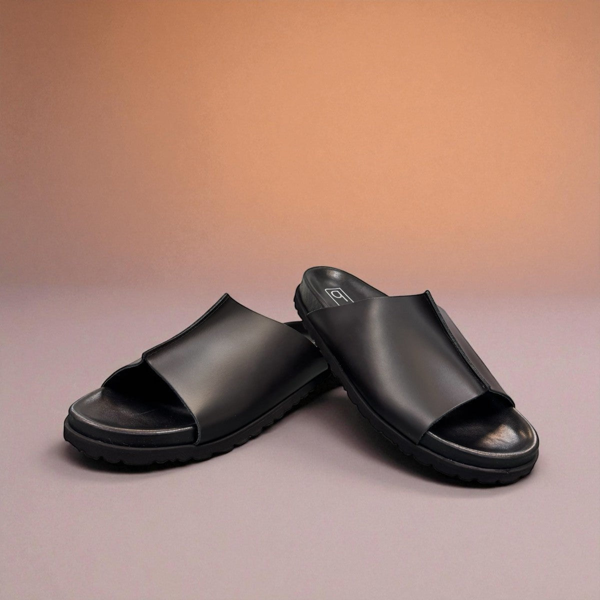 Biotime Eldora black genuine leather slide sandals with cushioned footbed and textured EVA outsole