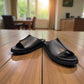Biotime Eldora black genuine leather slide sandals with cushioned footbed and textured EVA outsole
