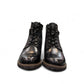 Biotime Lisa black boot showing the durable TPR lugged outsole for traction and stability.