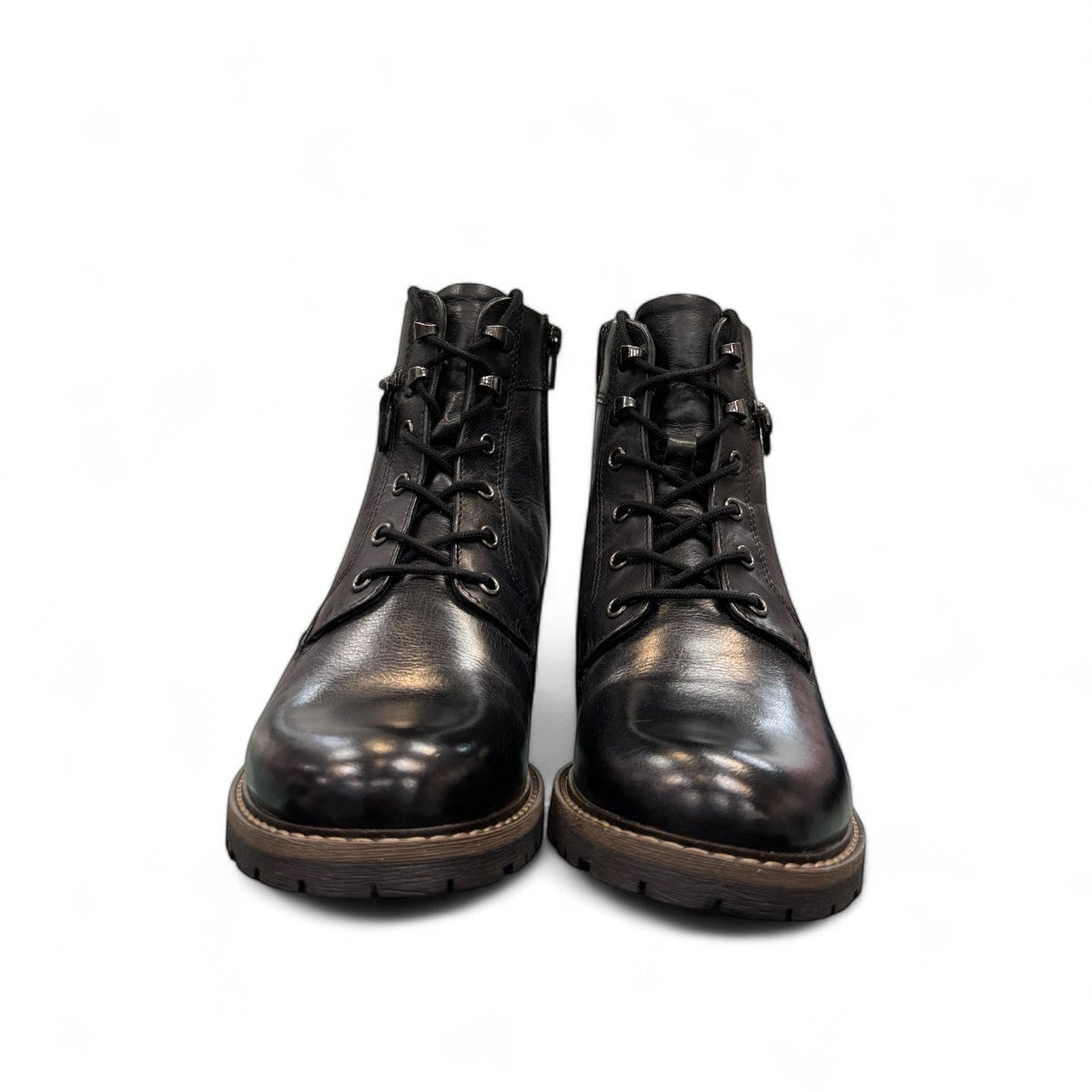 Biotime Lisa black boot showing the durable TPR lugged outsole for traction and stability.