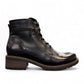 Biotime Lisa black boot showing the durable TPR lugged outsole for traction and stability.