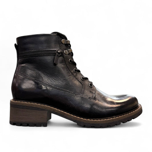 Biotime Lisa black boot showing the durable TPR lugged outsole for traction and stability.
