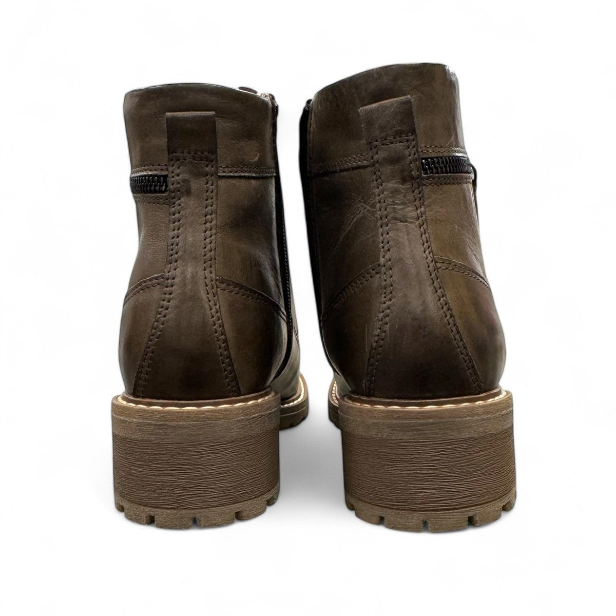 Biotime Lisa green boot showing the durable brown TPR lugged outsole for traction