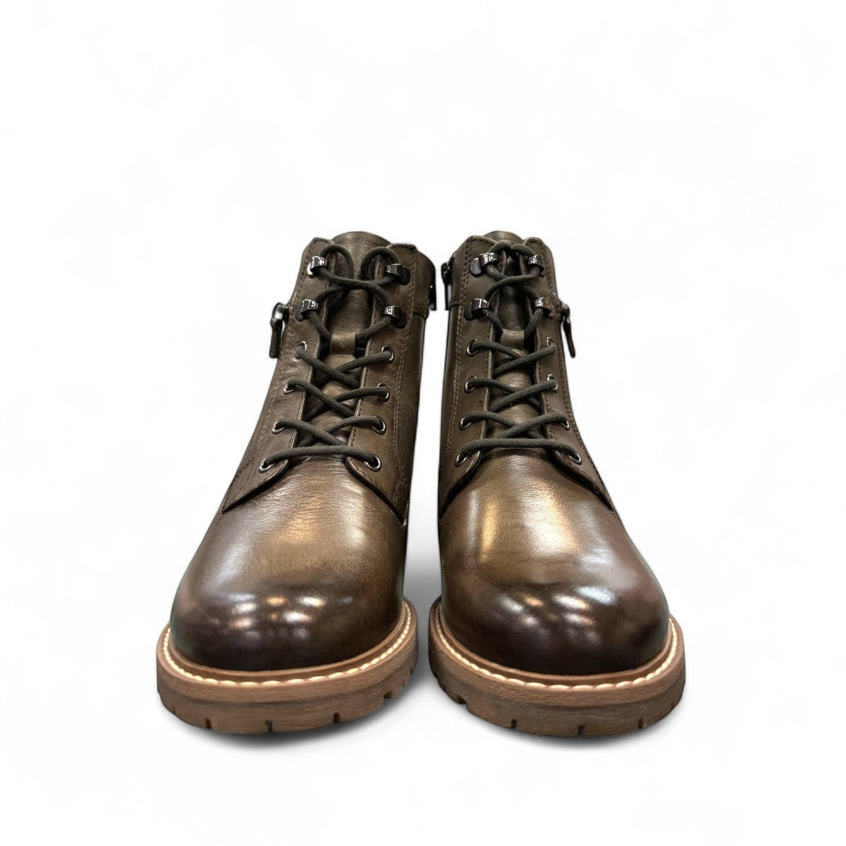 Biotime Lisa green boot showing the durable brown TPR lugged outsole for traction