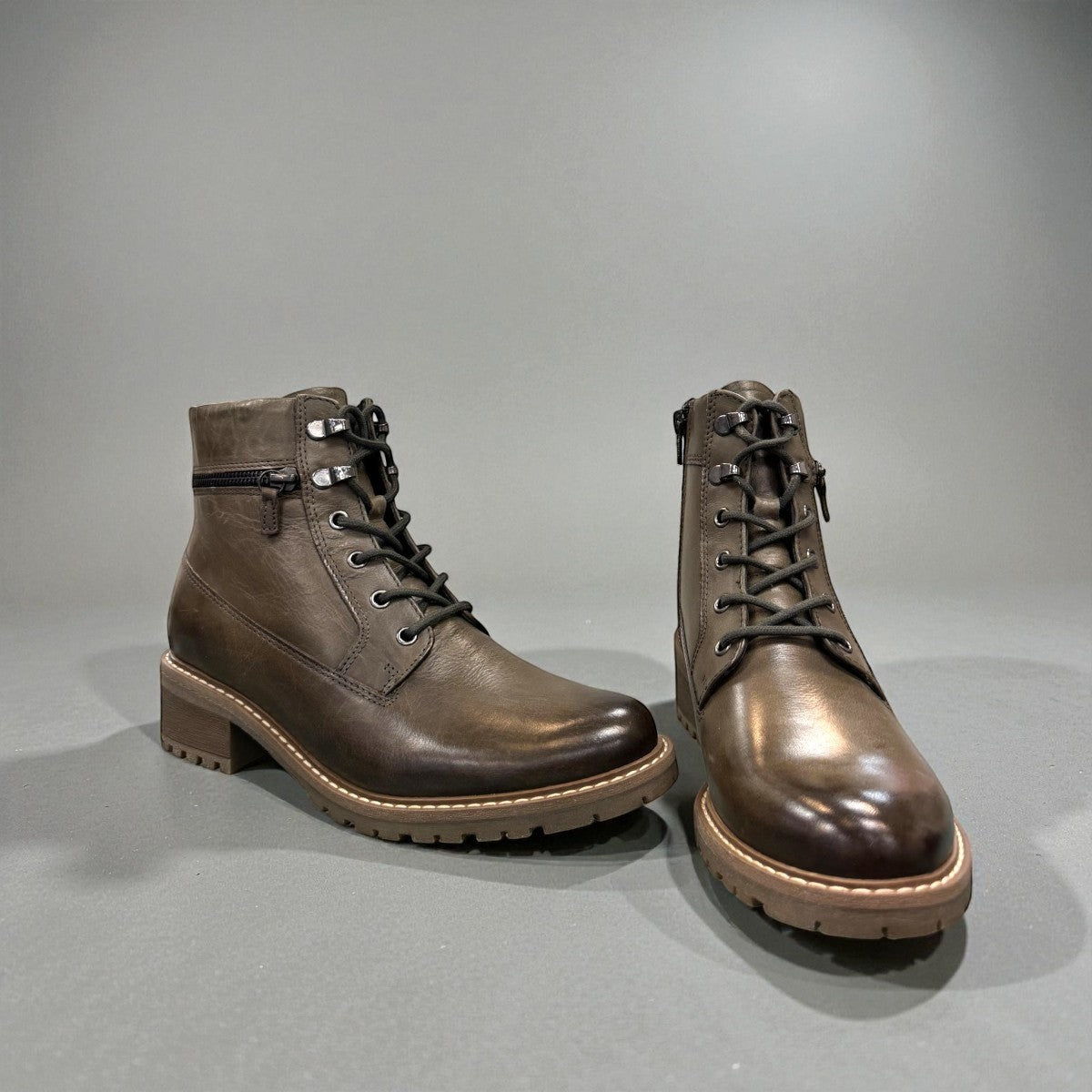 Biotime Lisa green boot showing the durable brown TPR lugged outsole for traction