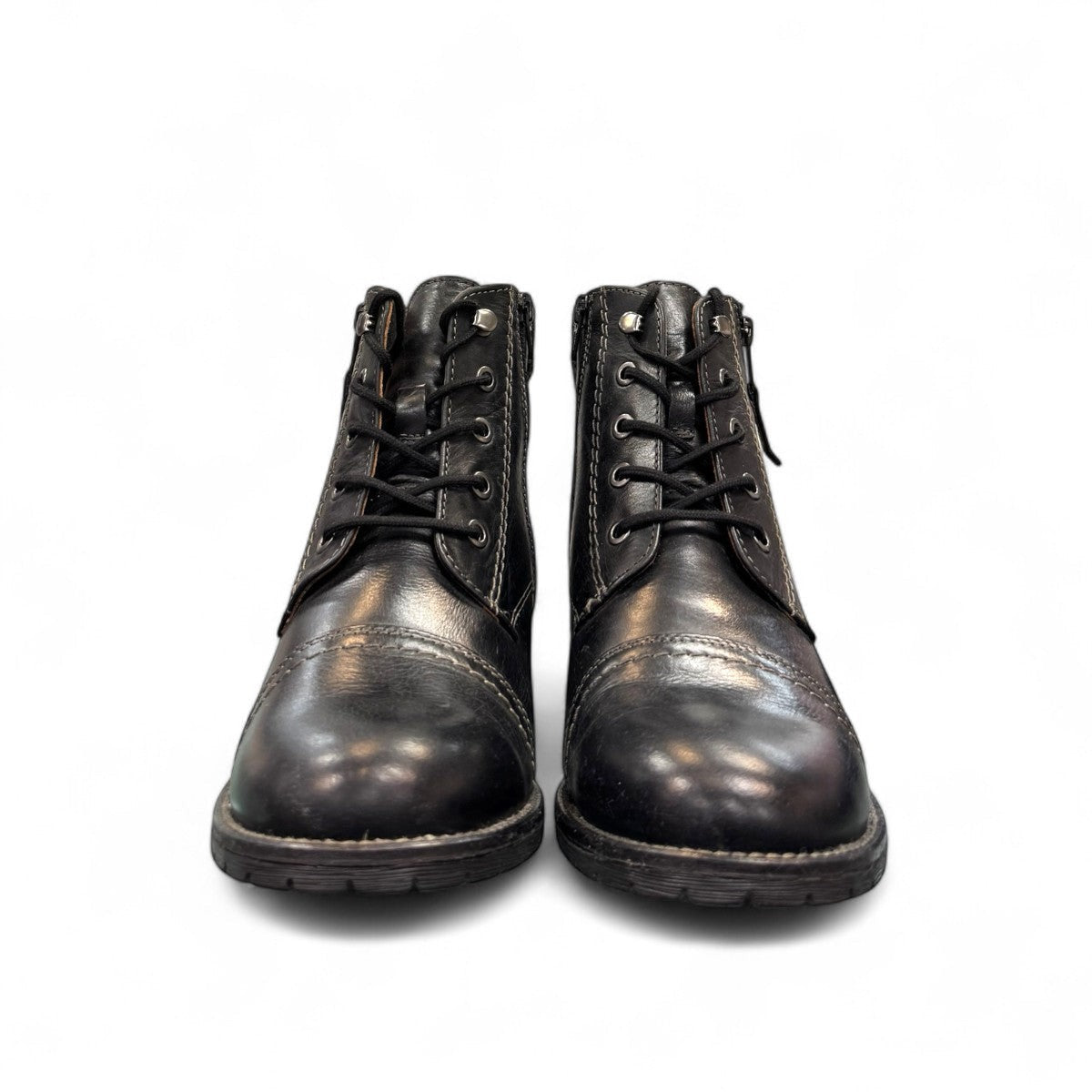 Biotime Stella black leather boots with lace-up front, side zippers, and durable treaded TPR outsoles.