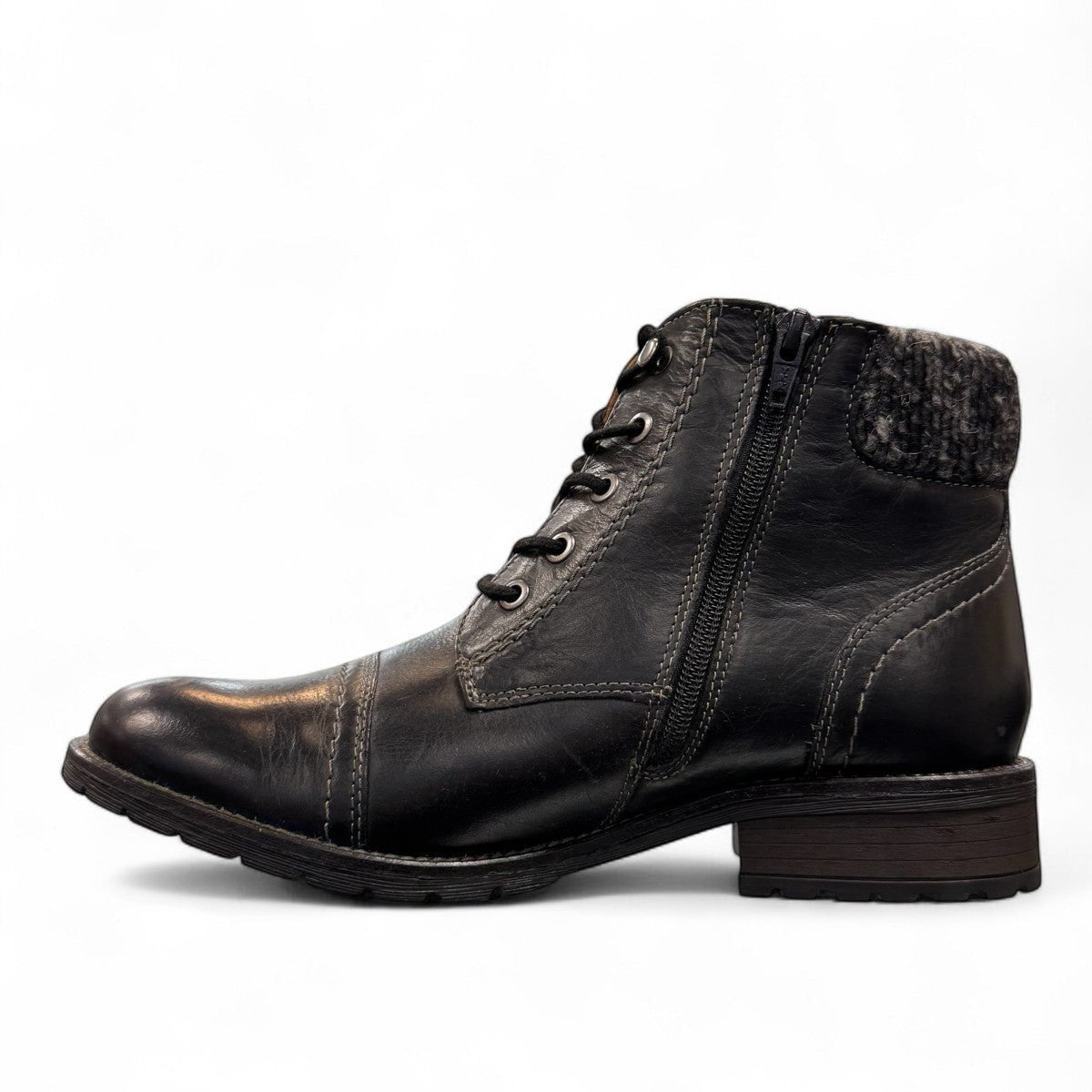 Biotime Stella black leather boots with lace-up front, side zippers, and durable treaded TPR outsoles.