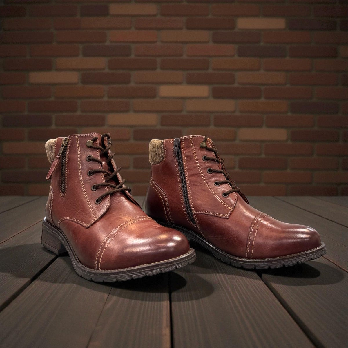Biotime Stella burgundy leather boots with dual zippers, laces, and durable traction outsoles.
