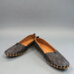 Biza Sophie black leather slip-on loafer with laser cut floral detailing and handstitched moccasin sole