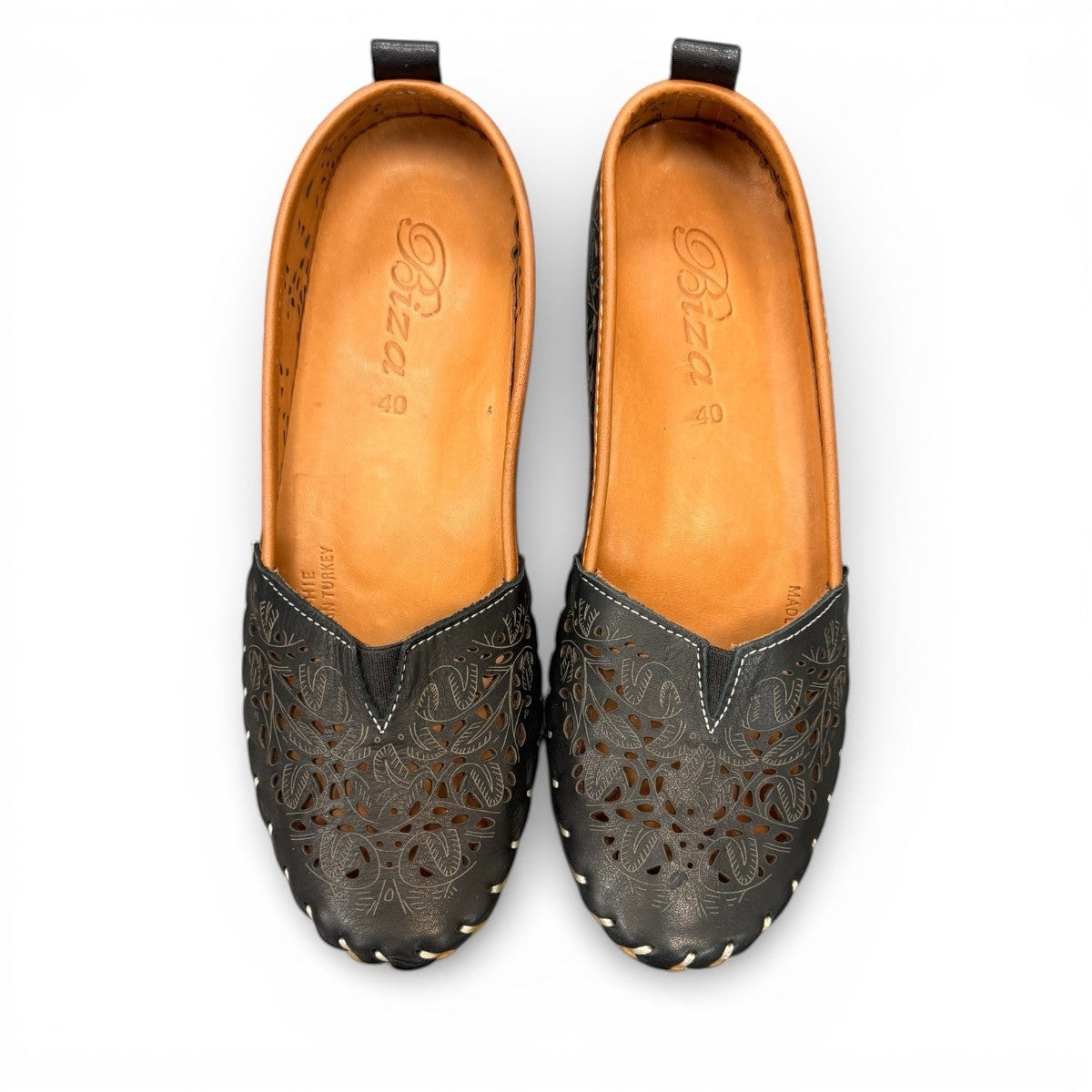 Biza Sophie black leather slip-on loafer with laser cut floral detailing and handstitched moccasin sole