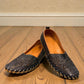 Biza Sophie black leather slip-on loafer with laser cut floral detailing and handstitched moccasin sole